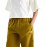 New Balance Pantaloni Wovent Sport Legacy Verde Donna