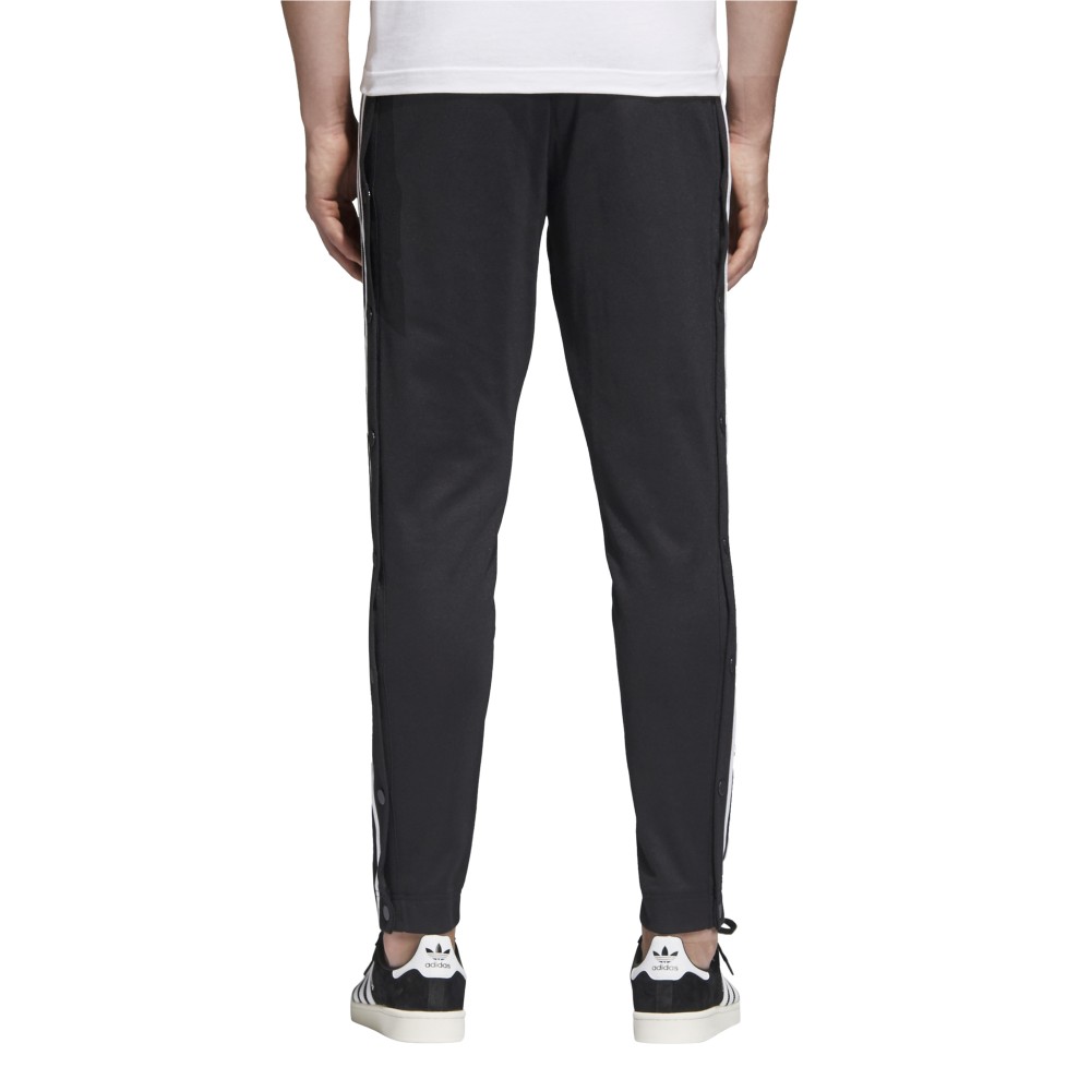 pantaloni adidas con bottoni ai lati