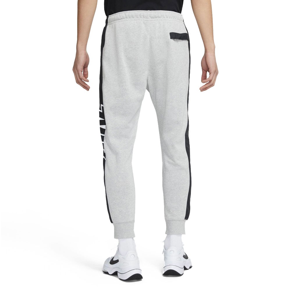 Nike Pantaloni Con Polsino Banda Grigio Uomo - Acquista online su Sportland