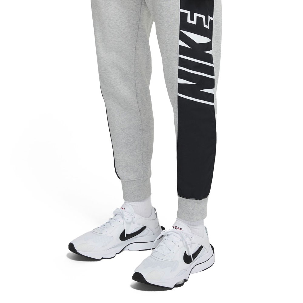 NIKE FELPA E PANTALONE IN TRIACETATO CON BANDA LATERALE Donna Nero bianco |  Mascheroni Sportswear